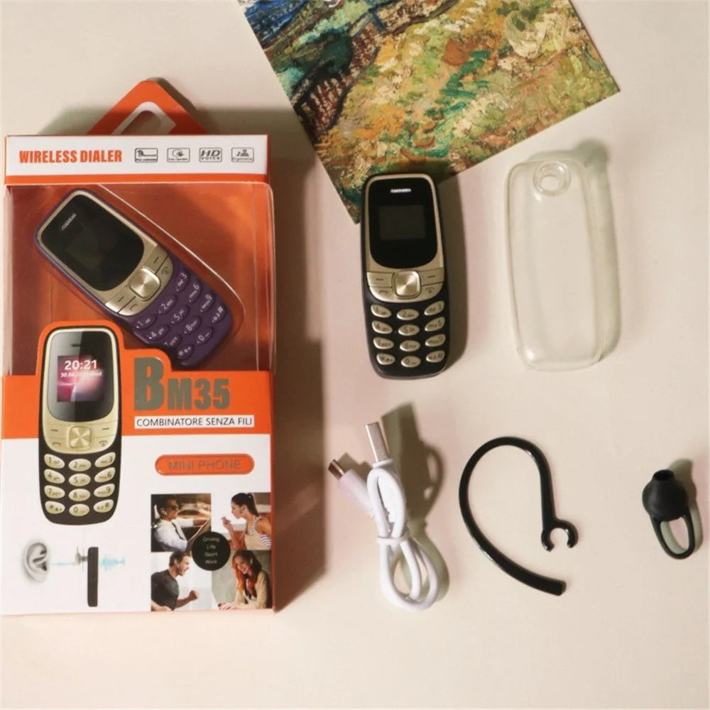 BM35 2G 0.66-Inch Mini Dual SIM Standby Slim Cell Phone - Black / Gold - 5