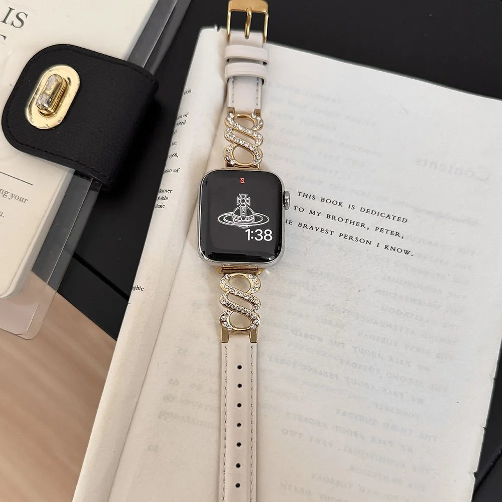 Wrist Strap for Apple Watch Series 11 10 42mm / 9 8 7 41mm / SE3 SE2 SE 6 5 4 40mm / 3 2 1 38mm S-Shape Metal Leather Band Rhinestone Decor - White / Gold Buckle - 2
