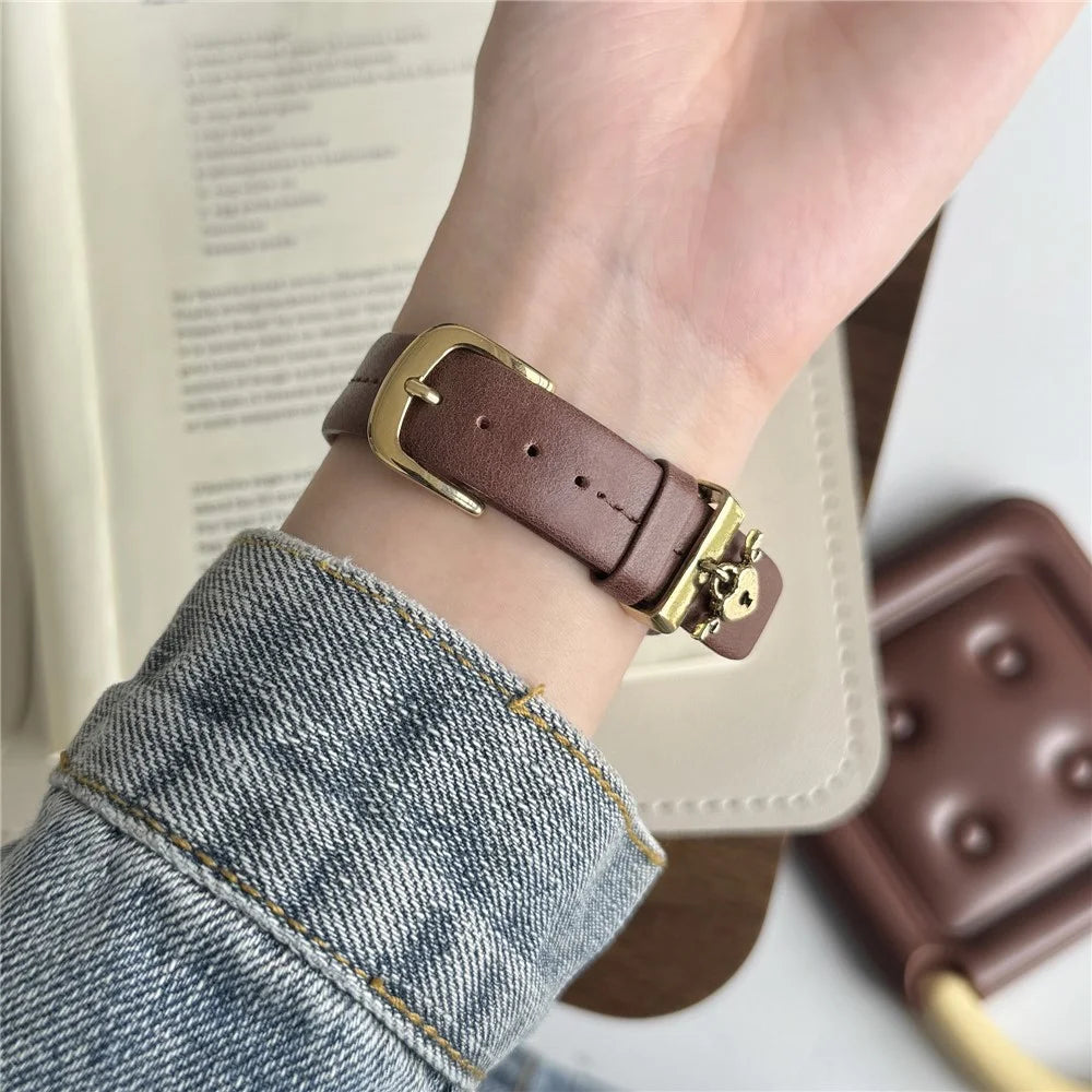 Wrist Strap for Apple Watch Ultra 3 2 1 49mm / Series 11 10 46mm / 9 8 7 45mm / SE3 SE2 SE 6 5 4 44mm / 3 2 1 42mm Heart Pendant Leather Watch Band - Coffee / Gold Buckle - 2