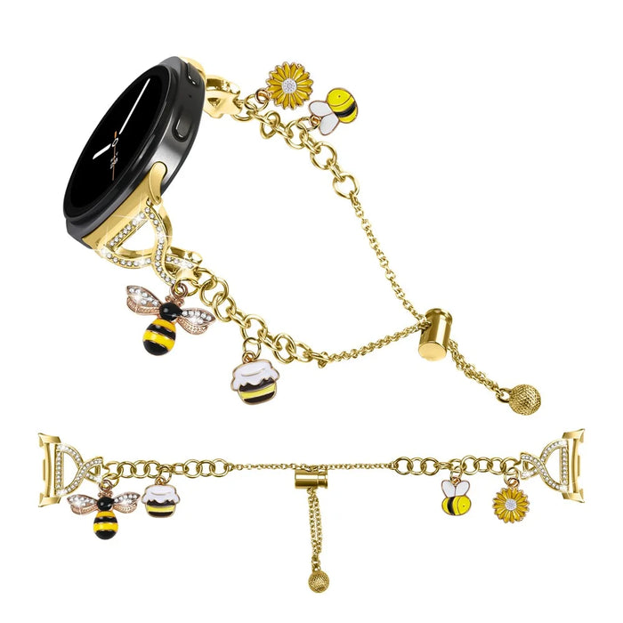 Electroplated Single Chain Style Watchband for Samsung Galaxy Watch8 44mm / 40mm / Watch8 Classic 46mm Metal Sliding Bracelet Strap with Heart / Key Pendant - Gold - 1