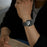 AHASTYLE BO06 Genuine Cow Leather Strap for Apple Watch Series 11 10 42mm / 9 8 7 41mm / SE3 SE2 SE 6 5 4 40mm / 3 2 1 38mm Pin Buckle Magnetic Watch Band - Black+Orange - 7