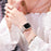 For Apple Watch Series 7 45mm Pearl Rhinestone Decor Drawstring Design Metal Bracelet Watch Strap + PC Watch Frame Protective Case - Rose Gold - 4