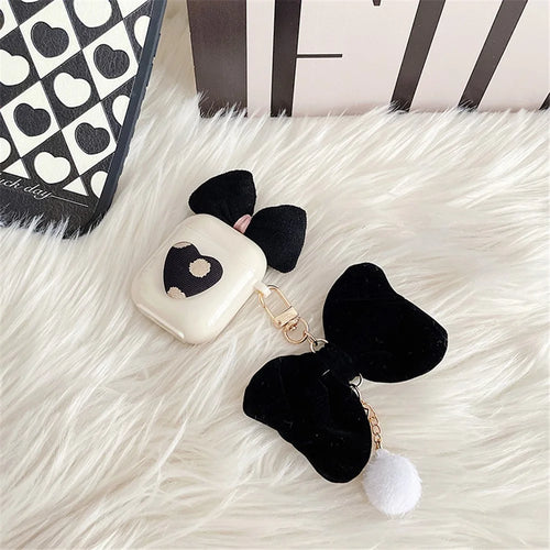 For Apple AirPods with Charging Case (2016)/(2019) / AirPods with Wireless Charging Case (2019) Cute TPU Protective Cover Bluetooth-compatible Earphone Case Sleeve with Plush Big Bow Pendant - 1