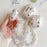 For Apple AirPods Pro Stylish Heart Pattern Bluetooth-compatible Earphone TPU Protective Cover Anti-drop Case with Flower Hand Strap - 3