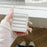 For AirPods with Charging Case (2016) / (2019) / AirPods with Wireless Charging Case (2019) Glitter Cover Down Jacket Design Carrying Case - White - 2