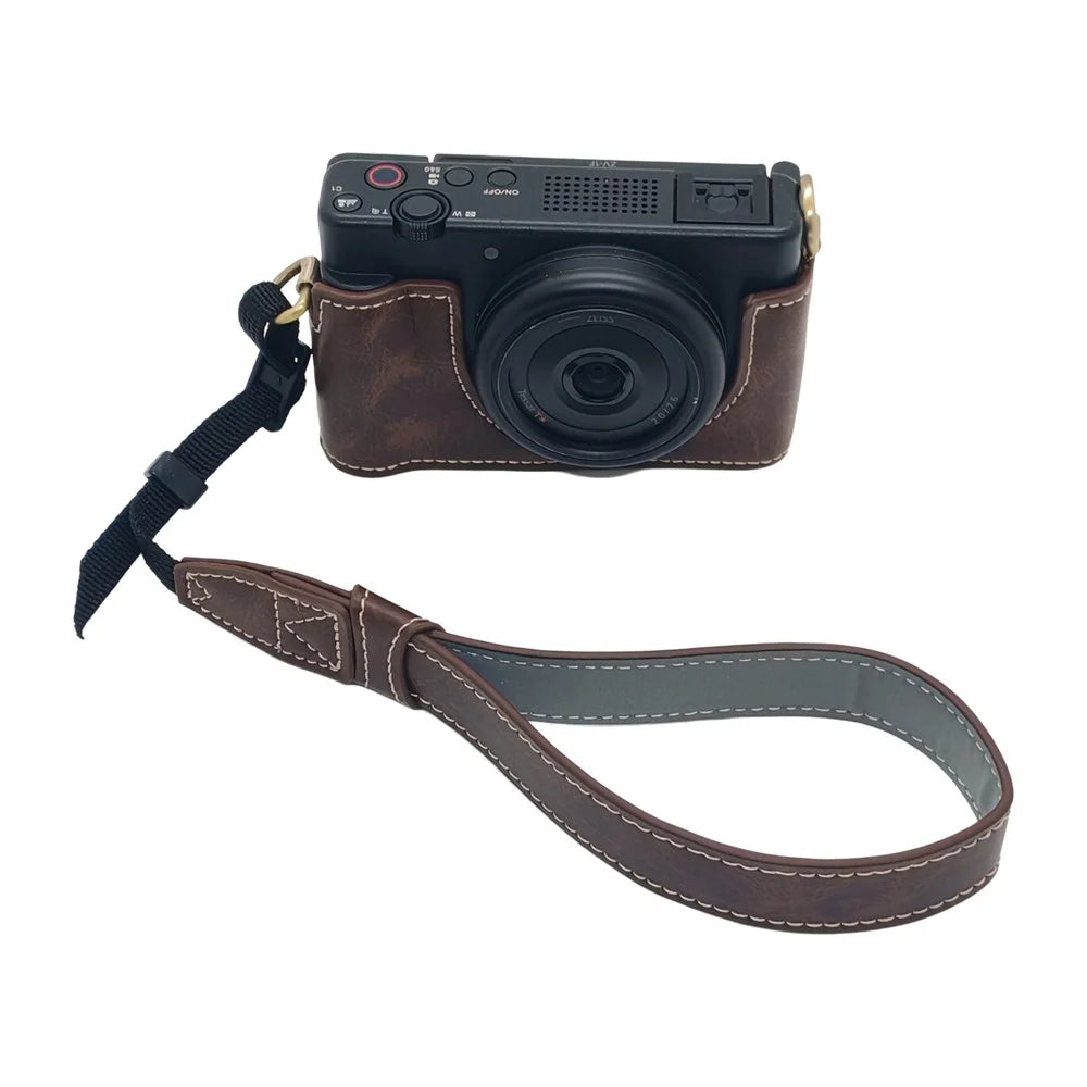 For Sony ZV-1 II / ZV-1F Camera Bottom Case with Hand Strap Battery Opening PU Leather Half Cover - Coffee - 1