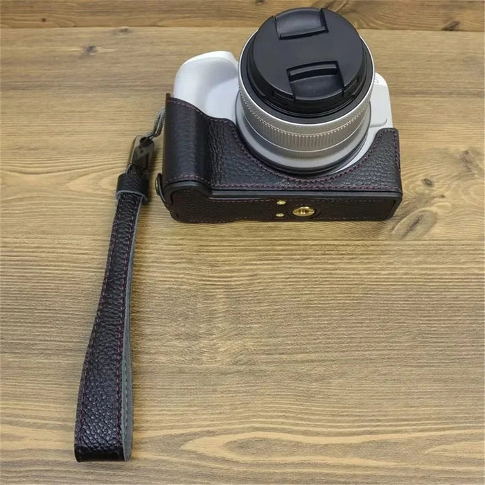 For Canon EOS R50 / R100 Genuine Cow Leather Camera Bottom Case Anti-drop Cover with Wrist Strap - Black - 2