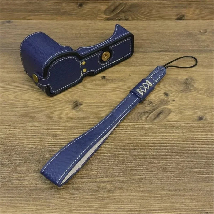 For Sony ZV-E10 PU Leather Bottom Case Battery Opening Design Camera Half Body Cover with Hand Strap - Sapphire - 2