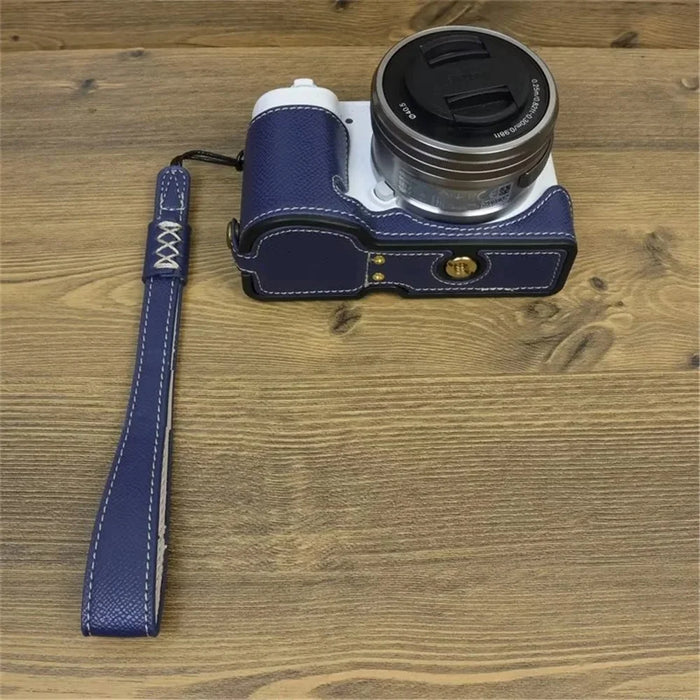 For Sony ZV-E10 PU Leather Bottom Case Battery Opening Design Camera Half Body Cover with Hand Strap - Sapphire - 3