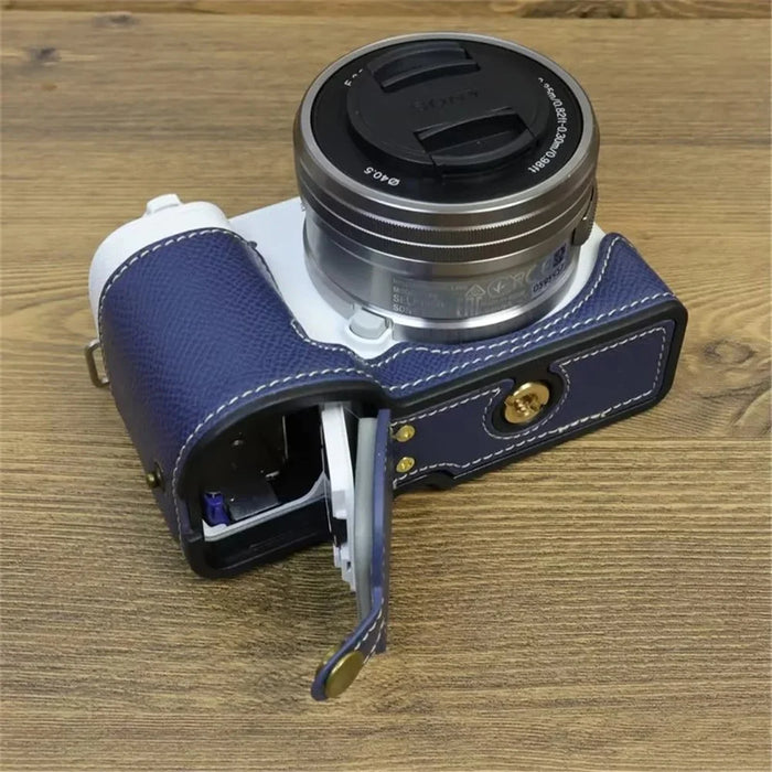 For Sony ZV-E10 PU Leather Bottom Case Battery Opening Design Camera Half Body Cover with Hand Strap - Sapphire - 4