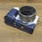 For Sony ZV-E10 PU Leather Bottom Case Battery Opening Design Camera Half Body Cover with Hand Strap - Sapphire - 7