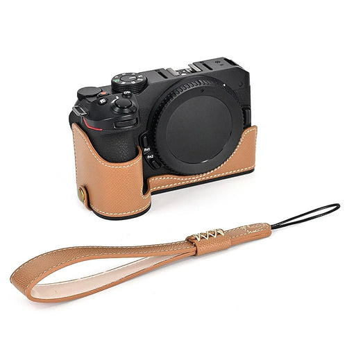 For Nikon Z30 / Z50 Battery Opening Design PU Leather Camera Cover Palm Texture Half Body Bottom Case with Wrist Strap - Khaki - 1